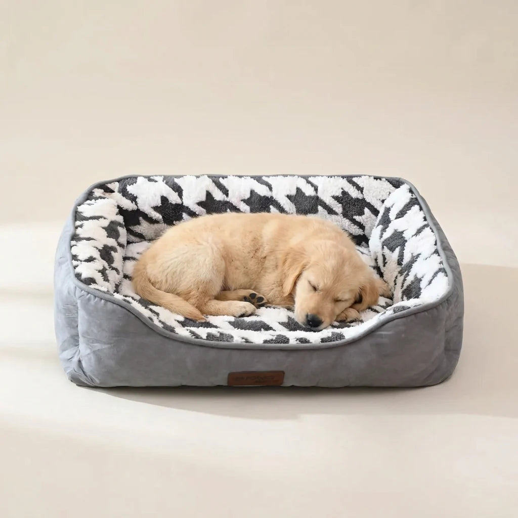 Bolster dog bed shown from above with plush rose circle lining