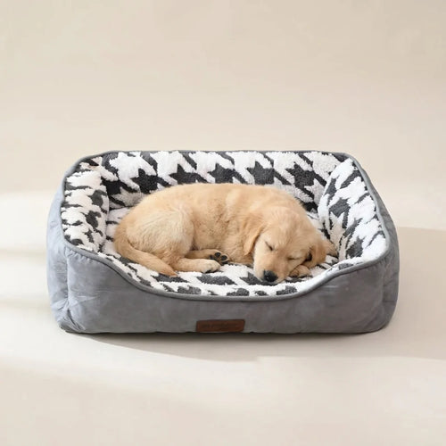 Bolster dog bed shown from above with plush rose circle lining