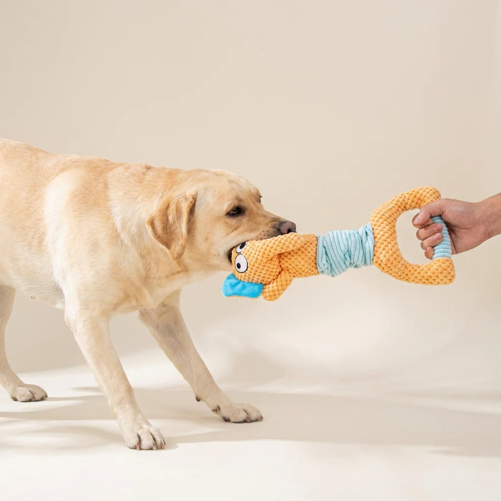 Plush elephant dog toy shown stretched out to full tug length