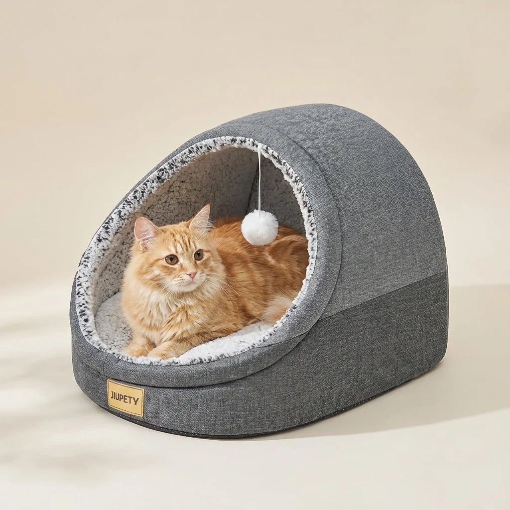Cat cave bed shown with the reversible inner cushion removed