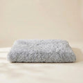 Large plush foldable pet mat bed with non-slip base, 37 by 25 inches
