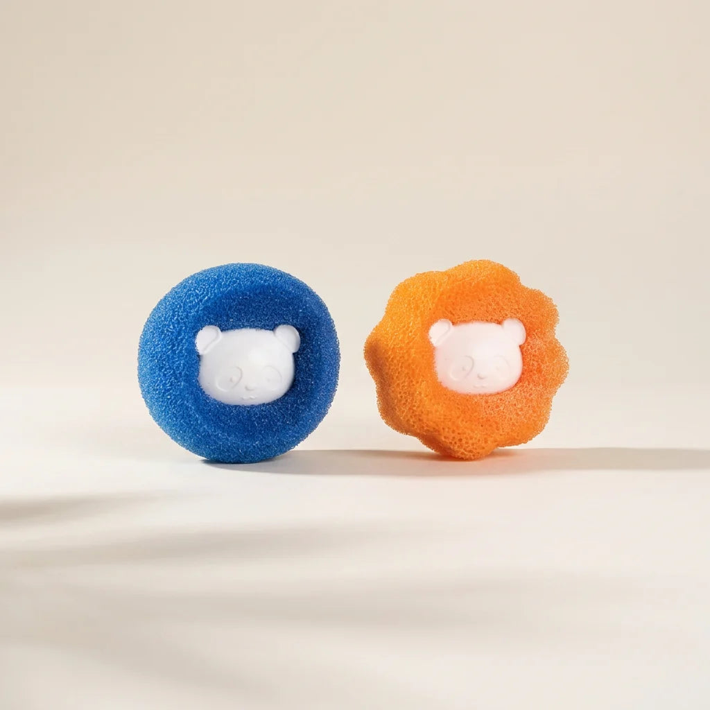 Microfibre laundry hair removal balls shown loose outside the box