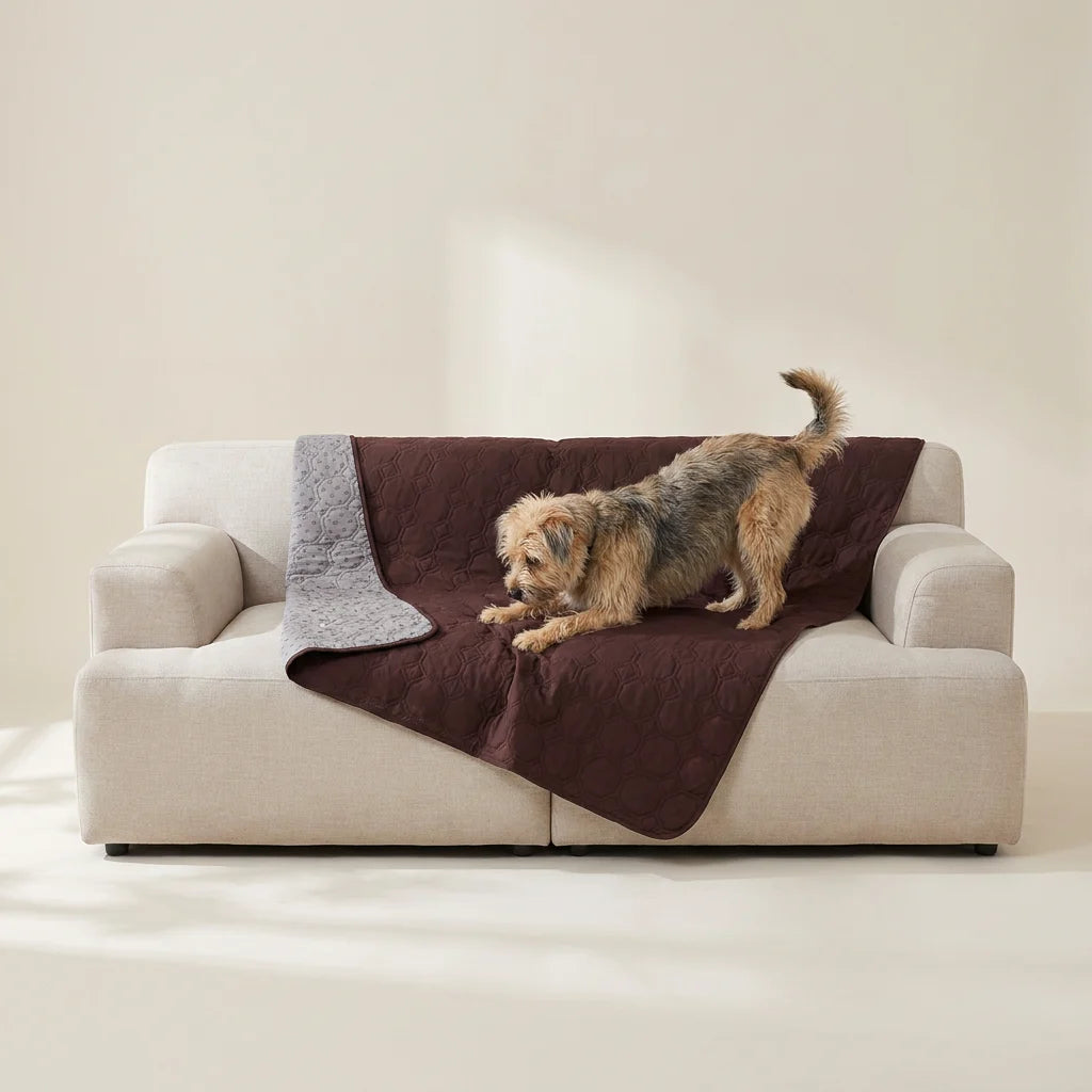Waterproof pet cover laid flat across furniture, showing the non-slip backing